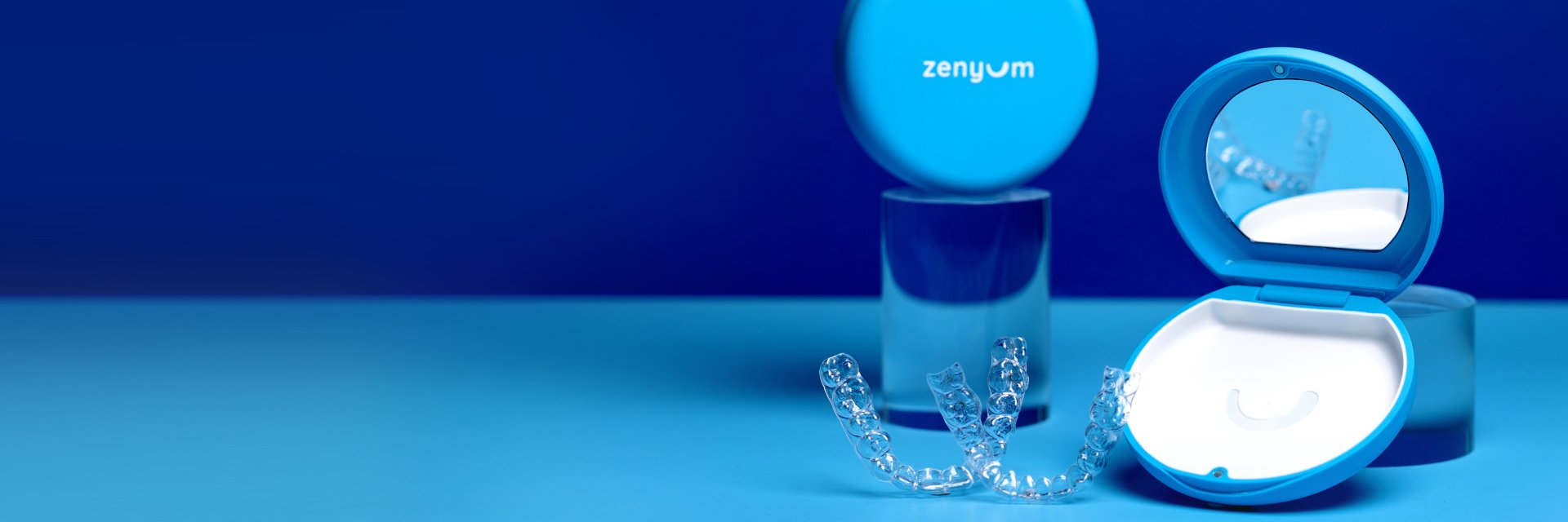 Zenyum clear aligners with blue casings
